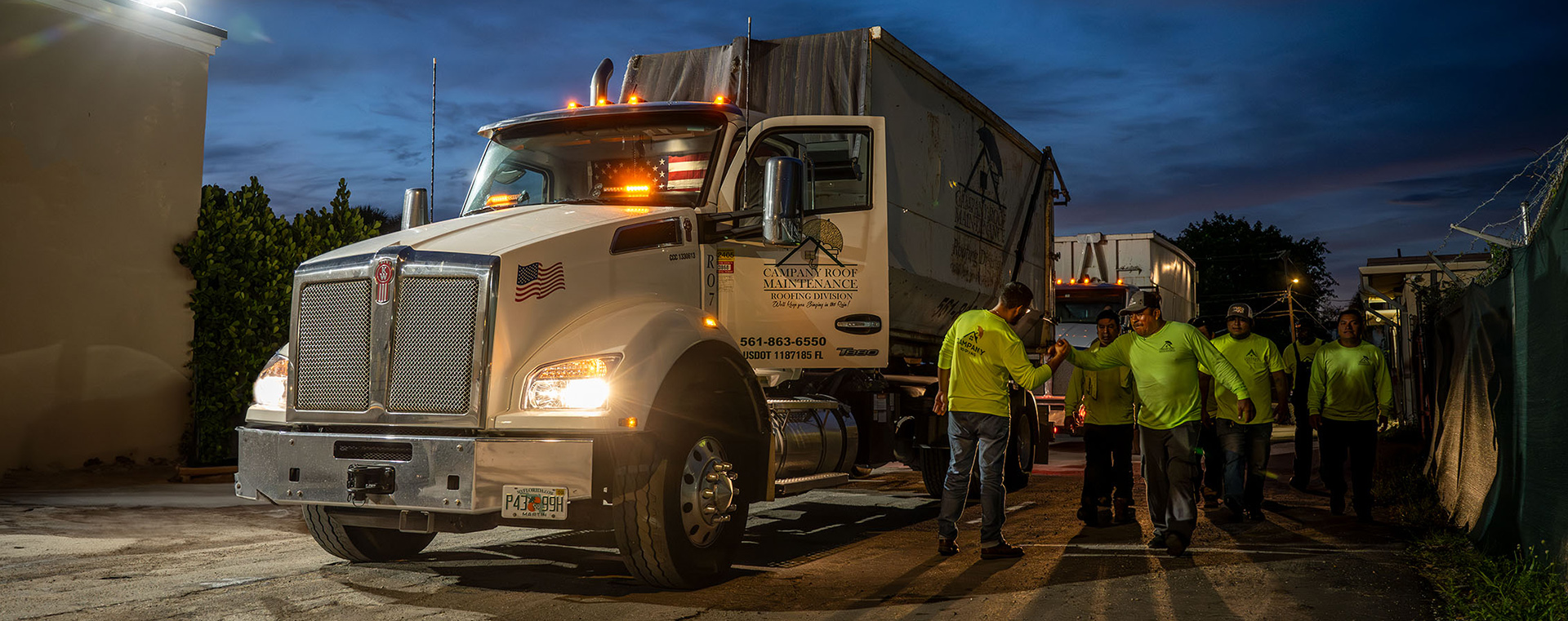 Campany Roofing trucks and crew leaving the West Palm Beach yard before sunrise